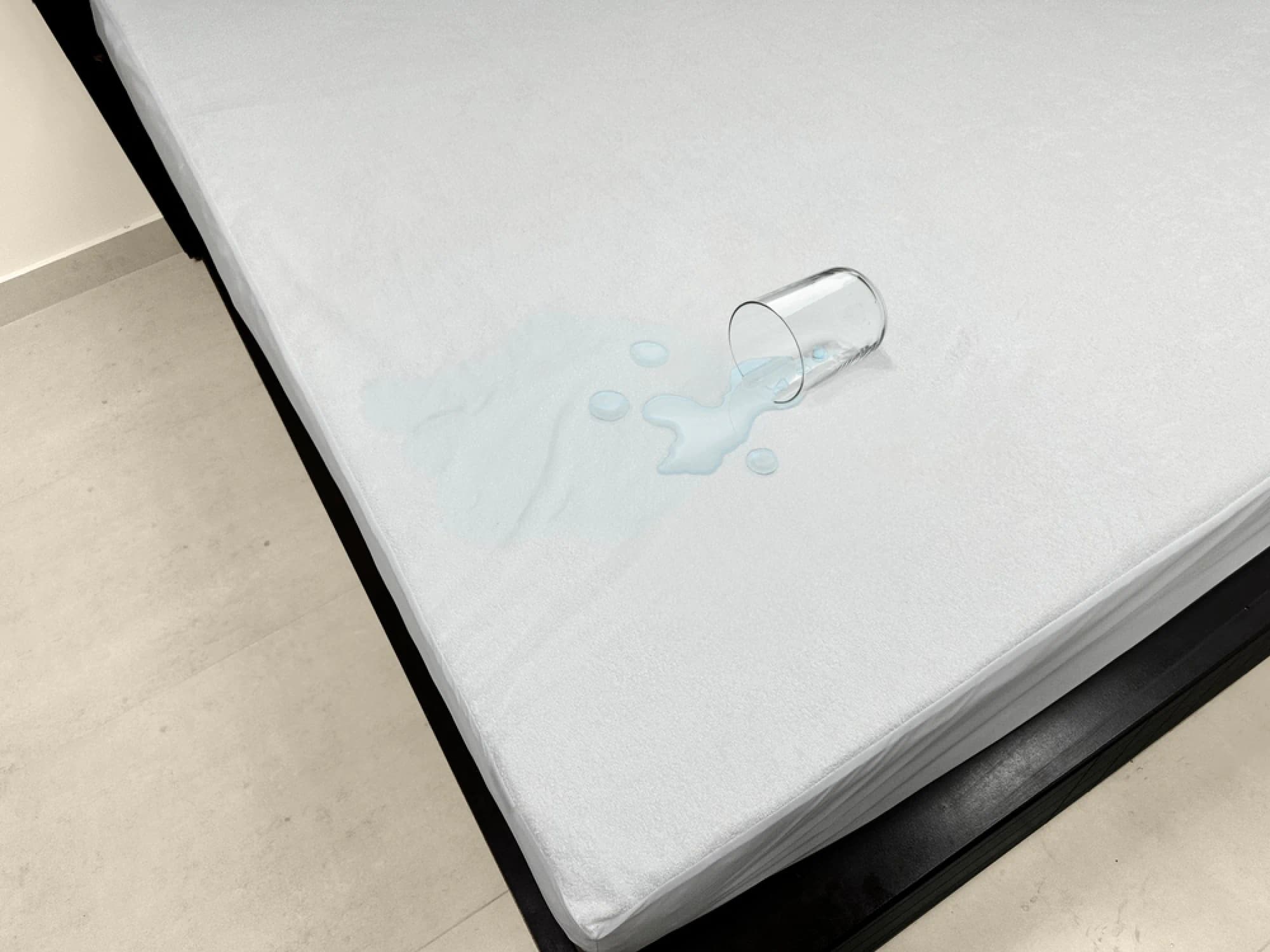 Water spilled on waterproof mattress protector
