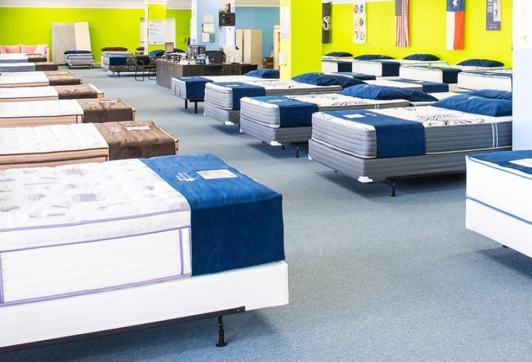 Mattresses lined up in our showroom in the Woodlands, TX